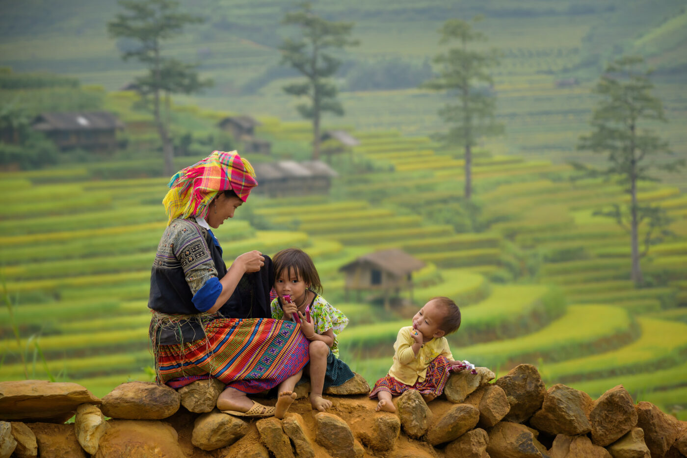 The smile of a young girl with her Lao Cai, Vietnam.