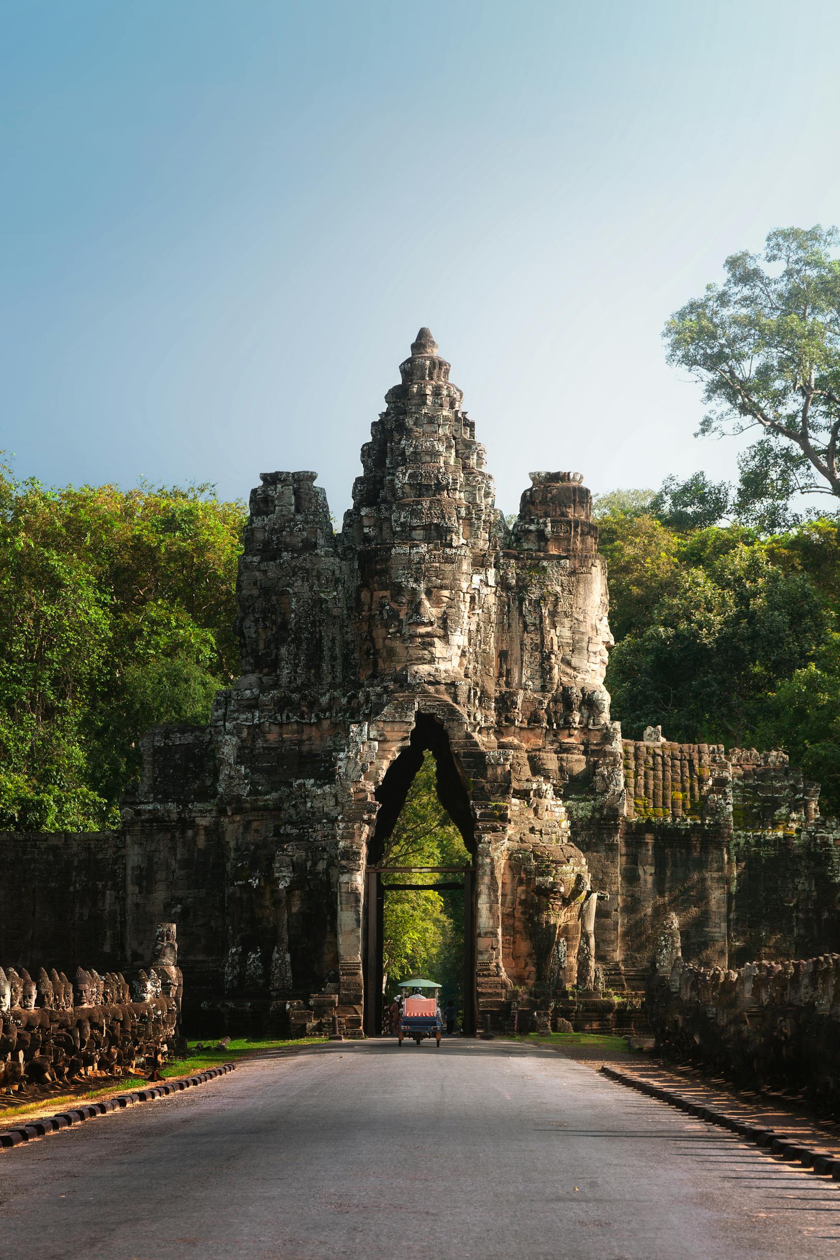 Explore the historic South Gate of Angkor Thom, a landmark near Siem Reap, Cambodia.